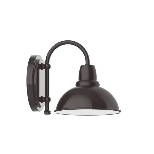 Our wall sconces are our smallest outdoor fixtures, but they add just the right amount of light to your entryway. Hang alone or in pairs on either side of a front door or garage, even inside next to a bed. Available in multiple shade styles to suit your décor, be it modern farmhouse, coastal cottage, or industrial loft. Collection: Cafe Finish: Architectural Bronze Glass: 8 inch Cafe Notes: Option (1) A19 LED and 1-Integrated 8W Width: 8.13" Height: 8.88" Length: 10.75" Weight: 7.00 lb Extension from Wall: 10.75" Canopy: 6.875" diameter Number of Bulbs: 1 Maximum Wattage: 100.00 W Bulb Type: A19 Bulb Base: E26 Medium Light Source: Incandescent or LED equivalent Dimmable Voltage: 120.00 V Country of Origin: US Safety Listing: UL/cUL Safety Rating: Wet Dark Sky LED Manufacturer Warranty: 1-year limited warranty on the fixture.