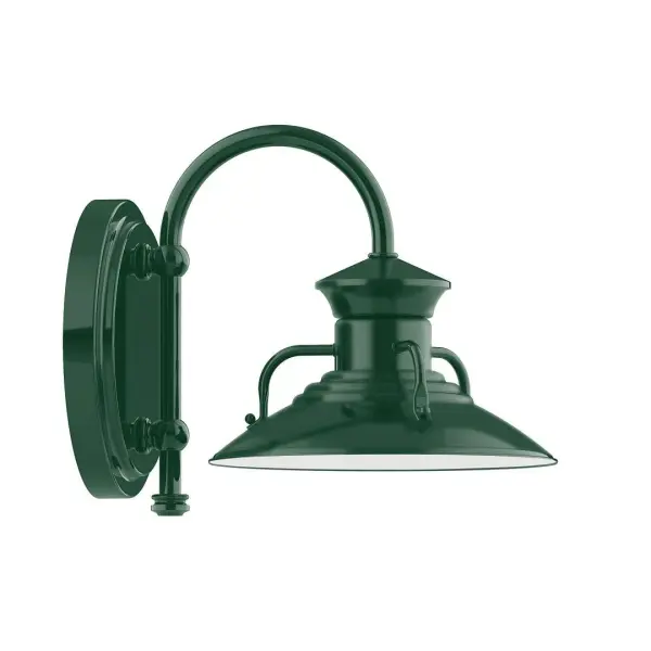 Our wall sconces are our smallest outdoor fixtures, but they add just the right amount of light to your entryway. Hang alone or in pairs on either side of a front door or garage, even inside next to a bed. Available in multiple shade styles to suit your décor, be it modern farmhouse, coastal cottage, or industrial loft. Collection: Homestead Finish: Forest Green Glass: 8 inch Homestead Width: 8.00" Height: 9.00" Length: 10.75" Weight: 7.00 lb Extension from Wall: 10.75" Canopy: 6.875" diameter Number of Bulbs: 1 Maximum Wattage: 8.00 W Bulb Type: LED Light Source: LED Light Output: 800.00 lm Color Temperature: 3000 K CRI: 90 Dimmable Rated Average Life: 50,000 Voltage: 120.00 V Country of Origin: US Safety Listing: UL/cUL Safety Rating: Wet Dark Sky LED Manufacturer Warranty: 1-year limited warranty on the fixture.