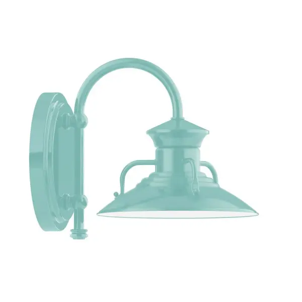 Our wall sconces are our smallest outdoor fixtures, but they add just the right amount of light to your entryway. Hang alone or in pairs on either side of a front door or garage, even inside next to a bed. Available in multiple shade styles to suit your décor, be it modern farmhouse, coastal cottage, or industrial loft. Collection: Homestead Finish: Sea Green Glass: 8 inch Homestead Width: 8.00" Height: 9.00" Length: 10.75" Weight: 7.00 lb Extension from Wall: 10.75" Canopy: 6.875" diameter Number of Bulbs: 1 Maximum Wattage: 8.00 W Bulb Type: LED Light Source: LED Light Output: 800.00 lm Color Temperature: 3000 K CRI: 90 Dimmable Rated Average Life: 50,000 Voltage: 120.00 V Country of Origin: US Safety Listing: UL/cUL Safety Rating: Wet Dark Sky LED Manufacturer Warranty: 1-year limited warranty on the fixture.