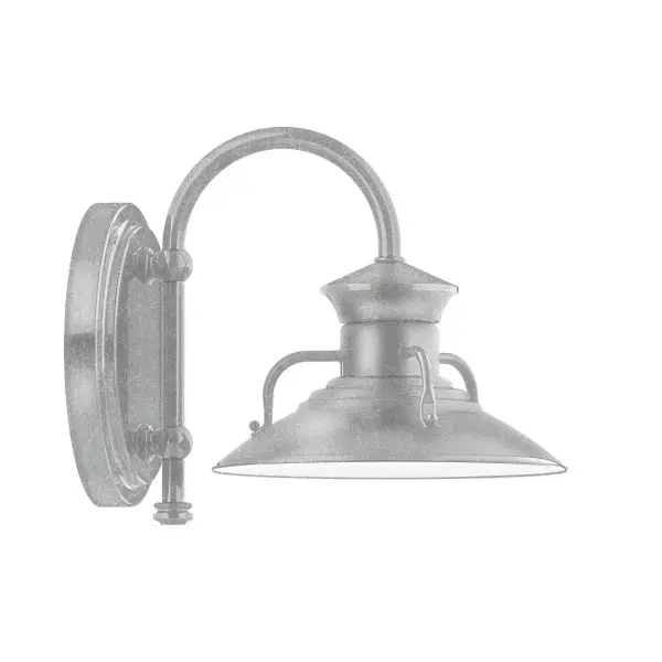Our wall sconces are our smallest outdoor fixtures, but they add just the right amount of light to your entryway. Hang alone or in pairs on either side of a front door or garage, even inside next to a bed. Available in multiple shade styles to suit your décor, be it modern farmhouse, coastal cottage, or industrial loft. Collection: Homestead Finish: Painted Galvanized Glass: 8 inch Homestead Width: 8.00" Height: 9.00" Length: 10.75" Weight: 7.00 lb Extension from Wall: 10.75" Canopy: 6.875" diameter Number of Bulbs: 1 Maximum Wattage: 8.00 W Bulb Type: LED Light Source: LED Light Output: 800.00 lm Color Temperature: 3000 K CRI: 90 Dimmable Rated Average Life: 50,000 Voltage: 120.00 V Country of Origin: US Safety Listing: UL/cUL Safety Rating: Wet Dark Sky LED Manufacturer Warranty: 1-year limited warranty on the fixture.