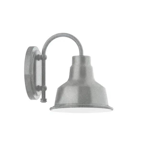 Our wall sconces are our smallest outdoor fixtures, but they add just the right amount of light to your entryway. Hang alone or in pairs on either side of a front door or garage, even inside next to a bed. Available in multiple shade styles to suit your décor, be it modern farmhouse, coastal cottage, or industrial loft. Collection: Warehouse Finish: Painted Galvanized Glass: 8 inch Warehouse Width: 8.00" Height: 10.00" Length: 10.75" Weight: 7.00 lb Extension from Wall: 10.75" Canopy: 6.625" diameter Number of Bulbs: 1 Maximum Wattage: 8.00 W Bulb Type: LED Light Source: LED Light Output: 800.00 lm Color Temperature: 3000 K CRI: 90 Dimmable Rated Average Life: 50,000 Voltage: 120.00 V Country of Origin: US Safety Listing: UL/cUL Safety Rating: Wet Dark Sky LED Manufacturer Warranty: 1-year limited warranty on the fixture.