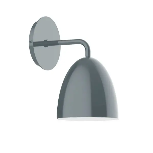 The Jill Wall Sconce collection reflects a more modern RLM style. Clean lines and basic geometric shapes define this series of wall lights. Suitable for both indoor and outdoor applications. Hang alone or in pairs on either side of a front door or garage, next to a bed, or in the bathroom. Available in multiple shade styles to suit your décor, be it modern farmhouse, coastal cottage, or industrial loft. Collection: Jill Finish: Slate Gray Glass: Aluminum Width: 6.00" Height: 10.13" Length: 8.13" Weight: 6.00 lb Extension from Wall: 8.25" Canopy: 5" diameter Number of Bulbs: 1 Maximum Wattage: 8.00 W Bulb Type: LED Light Source: LED Light Output: 800.00 lm Color Temperature: 3000 K CRI: 90 Dimmable Rated Average Life: 50,000 Voltage: 120.00 V Country of Origin: US Safety Listing: UL/cUL Safety Rating: Dry Dark Sky LED Manufacturer Warranty: 1-year limited warranty on the fixture.