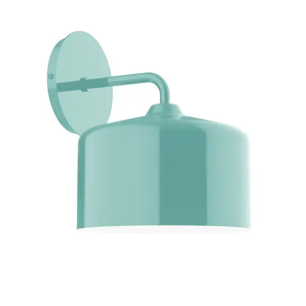 The Julia Wall Sconce collection reflects a more modern RLM style. Clean lines and basic geometric shapes define this series of wall lights. Suitable for both indoor and outdoor applications. Hang alone or in pairs on either side of a front door or garage, next to a bed, or in the bathroom. Available in multiple shade styles to suit your décor, be it modern farmhouse, coastal cottage, or industrial loft. Collection: Julia Finish: Sea Green Glass: Aluminum Width: 8.50" Height: 10.25" Length: 10.88" Weight: 6.00 lb Extension from Wall: 10.88" Canopy: 5" diameter Number of Bulbs: 1 Maximum Wattage: 8.00 W Bulb Type: LED Light Source: LED Light Output: 800.00 lm Color Temperature: 3000 K CRI: 90 Dimmable Rated Average Life: 50,000 Voltage: 120.00 V Country of Origin: US Safety Listing: UL/cUL Safety Rating: Dry Dark Sky LED Manufacturer Warranty: 1-year limited warranty on the fixture.