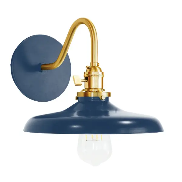 The Uno Wall Sconce is a nod to our industrial roots. Designed around a single Uno socket and shade holder, with multiple shades in various materials, the options for this series are endless. These sconces are for interior use, great fixtures in a living area, bedroom or kitchen. Collection: Uno Finish: Navy w/Brushed Brass Glass: 10 inch Uno Notes: Option (1) A19 LED or A19 LED Filament Width: 10.00" Height: 8.25" Length: 11.63" Weight: 6.00 lb Extension from Wall: 11.63" Canopy: 5" diameter Number of Bulbs: 1 Maximum Wattage: 100.00 W Bulb Type: A19 Bulb Base: E26 Medium Light Source: Incandescent or LED equivalent Dimmable Voltage: 120.00 V Country of Origin: US Safety Listing: UL/cUL Safety Rating: Dry Dark Sky LED Manufacturer Warranty: 1-year limited warranty on the fixture.