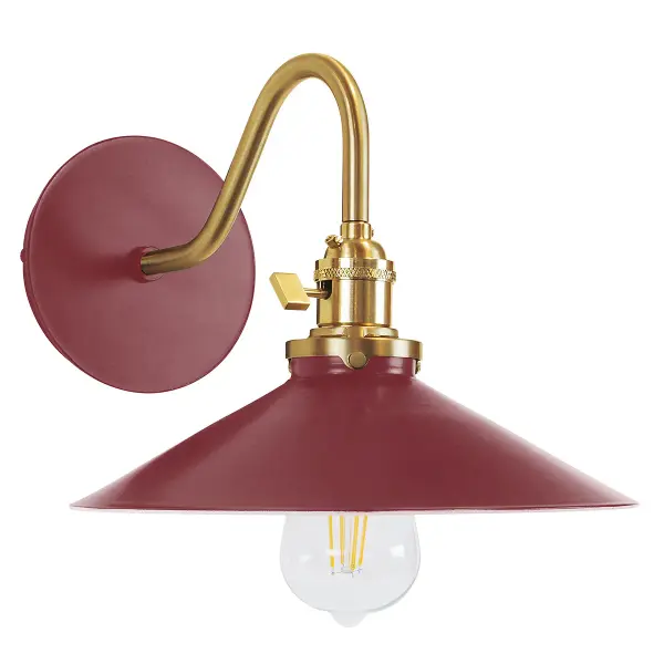 The Uno Wall Sconce is a nod to our industrial roots. Designed around a single Uno socket and shade holder, with multiple shades in various materials, the options for this series are endless. These sconces are for interior use, great fixtures in a living area, bedroom or kitchen. Collection: Uno Finish: Barn Red w/Brushed Brass Glass: 10 inch Uno Notes: Option (1) A19 LED or A19 LED Filament Width: 10.00" Height: 8.50" Length: 12.75" Weight: 6.00 lb Extension from Wall: 12.75" Canopy: 5" diameter Number of Bulbs: 1 Maximum Wattage: 100.00 W Bulb Type: A19 Bulb Base: E26 Medium Light Source: Incandescent or LED equivalent Dimmable Voltage: 120.00 V Country of Origin: US Safety Listing: UL/cUL Safety Rating: Dry Dark Sky LED Manufacturer Warranty: 1-year limited warranty on the fixture.