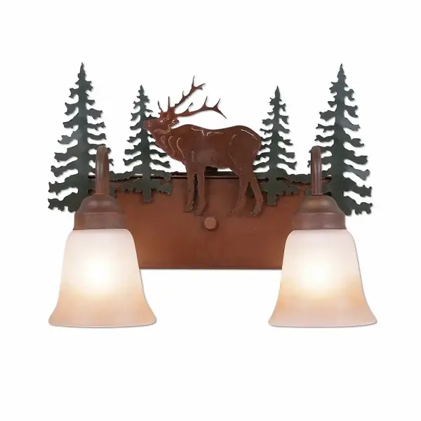 Country style Bath Vanity Lights handmade in USA by Avalanche Ranch Lighting. This light features our exclusive metal wildlife art of a Elk. This Bath 2 Light is ideal for anyone looking to add rustic character or unique log home lighting to their home. Dimensions (inches): 13h x 16w and Takes 2 - Type A19 bulbs - 100W max. each Collection: Denali-Mountain Elk Finish: Cedar Green/Rust Patina Glass: Two-Toned Amber Cream Glass Width: 16.00" Height: 13.00" Extension from Wall: 8.00" Number of Bulbs: 2 Maximum Wattage: 100.00 W Bulb Type: A19 Bulb Base: Medium