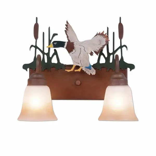 Ski Cabin style Bath Vanity Lights handmade in USA by Avalanche Ranch Lighting. This light features our exclusive metal wildlife art of a Mallard. This Bath 2 Light is ideal for anyone looking to add rustic character or unique log home lighting to their home. Dimensions (inches): 13h x 16w and Takes 2 - Type A19 bulbs - 100W max. each Collection: Denali-Mallard Duck Finish: Waterfowl/Rust Patina Glass: Two-Toned Amber Cream Glass Width: 16.00" Height: 13.00" Extension from Wall: 8.00" Number of Bulbs: 2 Maximum Wattage: 100.00 W Bulb Type: A19 Bulb Base: Medium