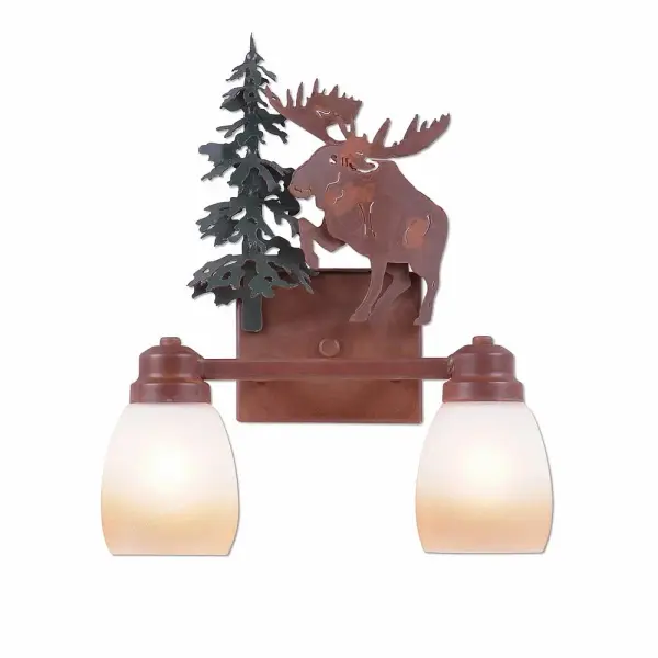 Cabin style Bath Vanity Lights handmade in USA by Avalanche Ranch Lighting. This light features our exclusive metal wildlife art of a Moose. This Bath 2 Light is ideal for anyone looking to add rustic character or unique log home lighting to their home. Dimensions (inches): 16h x 13w and Takes 2 - Type A19 bulbs - 100W max. each Collection: Parkshire-Alaska Moose Finish: Cedar Green/Rust Patina Glass: Egg Two-Toned Amber Creame Glass Width: 13.00" Height: 16.00" Extension from Wall: 5.00" Number of Bulbs: 2 Maximum Wattage: 60.00 W Bulb Type: A19 Bulb Base: Medium