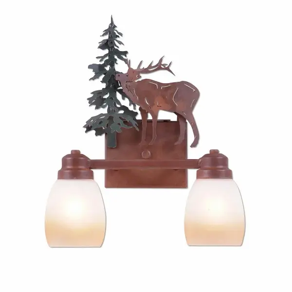Lake Cabin style Bath Vanity Lights handmade in USA by Avalanche Ranch Lighting. This light features our exclusive metal wildlife art of a Elk. This Bath 2 Light is ideal for anyone looking to add rustic character or unique log home lighting to their home. Dimensions (inches): 16h x 13w and Takes 2 - Type A19 bulbs - 100W max. each Collection: Parkshire-Mountain Elk Finish: Cedar Green/Rust Patina Glass: Egg Two-Toned Amber Creame Glass Width: 13.00" Height: 16.00" Extension from Wall: 5.00" Number of Bulbs: 2 Maximum Wattage: 60.00 W Bulb Type: A19 Bulb Base: Medium