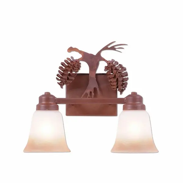 Rustic style Bath Vanity Lights handmade in USA by Avalanche Ranch Lighting. This light features our exclusive metal wildlife art of a Pine Cone. This Bath 2 Light is ideal for anyone looking to add rustic character or unique log home lighting to their home. Dimensions (inches): 12h x 13w and Takes 2 - Type A19 bulbs - 100W max. each Collection: Parkshire-Spruce Cone Finish: Rust Patina Glass: Two-Toned Amber Cream Glass Width: 13.00" Height: 12.00" Extension from Wall: 5.00" Number of Bulbs: 2 Maximum Wattage: 60.00 W Bulb Type: A19 Bulb Base: Medium