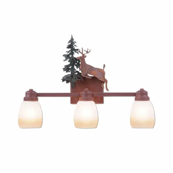 Lake Cabin style Bath Vanity Lights handmade in USA by Avalanche Ranch Lighting. This light features our exclusive metal wildlife art of a Deer. This Bath 3 Light is ideal for anyone looking to add rustic character or unique log home lighting to their home. Dimensions (inches): 16h x 22w and Takes 3 - Type A19 bulbs - 100W max. each Collection: Parkshire-Valley Deer Finish: Cedar Green/Rust Patina Glass: Egg Two-Toned Amber Creame Glass Width: 22.00" Height: 16.00" Extension from Wall: 5.00" Number of Bulbs: 3 Maximum Wattage: 60.00 W Bulb Type: A19 Bulb Base: Medium