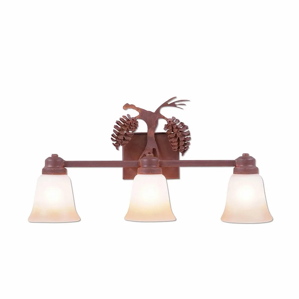 Parkshire-Spruce Cone Three Light Bath Vanity Light in Rust Patina