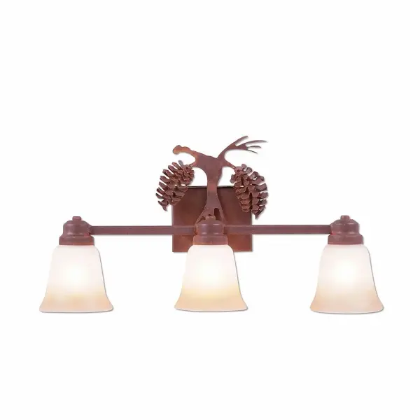 Ski Cabin style Bath Vanity Lights handmade in USA by Avalanche Ranch Lighting. This light features our exclusive metal wildlife art of a Pine Cone. This Bath 3 Light is ideal for anyone looking to add rustic character or unique log home lighting to their home. Dimensions (inches): 12h x 22w and Takes 3 - Type A19 bulbs - 100W max. each Collection: Parkshire-Spruce Cone Finish: Rust Patina Glass: Two-Toned Amber Cream Glass Width: 22.00" Height: 12.00" Extension from Wall: 5.00" Number of Bulbs: 3 Maximum Wattage: 60.00 W Bulb Type: A19 Bulb Base: Medium