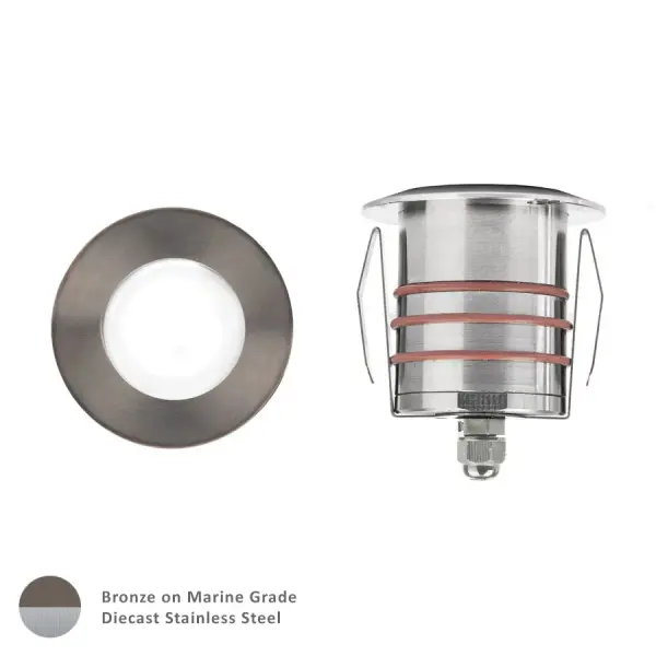 LED Landscape recessed inground indicator luminaire for both soft and hard ground applications available in 1" or 2" sizes with round, slim, and square face plate options. The indicator light is perfect for outdoor applications, including wells and ponds, decks and patios, inground, as well as ceiling and wall applications. Factory sealed and IP68 Rated for Wet Locations or continuous immersion up to 5 meters underwater. Each indicator light includes 6' of low voltage burial cable, direct burial gel-filled wire nuts, and an optional spring retention clip. Magnetic Power supply is required. Concrete Pour Kits are available for additional installation options. Collection: 2021 Sub-Brand: Landscape Finish: Bronze Stainless Steel Notes: 2In Inground LED 12V Round Indicator Light In Bronzed Stainless Steel Width: 2.75" Height: 3.13" Length: 2.75" Weight: 1.25 lb Extension from Wall: 2.75" Wire: 6` Bulbs Included Number of Bulbs: 1 Maximum Wattage: 4.00 W Bulb Type: Module Bulb Base: LED Module Light Source: LED Light Output: 170.00 lm Delivered Lumens: 245.00 lm Color Temperature: 3000 K CRI: 85 Dimmable Beam Spread: 25.00° Rated Average Life: 70000 Voltage: 9.00 V Material: Solid stainless steel construction Country of Origin: China Safety Listing: UL, cUL Safety Rating: UL, cUL LED Manufacturer Warranty: 10 Year Instructions Parts Diagram