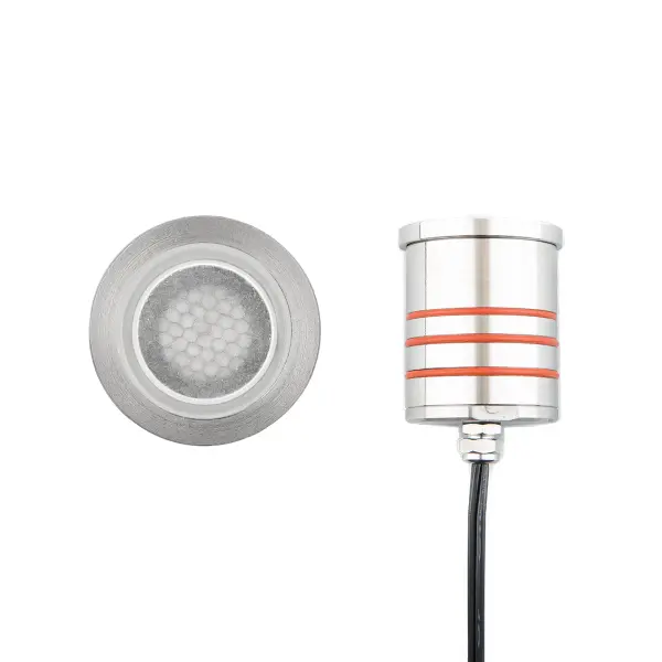 LED Landscape recessed inground indicator luminaire for both soft and hard ground applications available in 1" or 2" sizes with round, slim, and square face plate options. The indicator light is perfect for outdoor applications, including wells and ponds, decks and patios, inground, as well as ceiling and wall applications. Factory sealed and IP68 Rated for Wet Locations or continuous immersion up to 5 meters underwater. Each indicator light includes 6' of low voltage burial cable, direct burial gel-filled wire nuts, and an optional spring retention clip. Magnetic Power supply is required. Concrete Pour Kits are available for additional installation options. Collection: 2012 Sub-Brand: Landscape Finish: Stainless Steel Notes: 2In Inground LED 12V Slim Round Indicator Light With Honeycomb Louver In Stainless Steel Width: 2.06" Height: 3.13" Length: 2.06" Weight: 1.19 lb Extension from Wall: 2.06" Bulbs Included Number of Bulbs: 1 Maximum Wattage: 4.00 W Bulb Type: Module Bulb Base: LED Module Light Source: LED Light Output: 170.00 lm Delivered Lumens: 165.00 lm Color Temperature: 3000 K CRI: 85 Dimmable Beam Spread: 25.00° Rated Average Life: 70000 Voltage: 9.00 V Material: Solid stainless steel construction Country of Origin: Thailand Safety Listing: UL, cUL Safety Rating: UL, cUL LED Manufacturer Warranty: 10 year, Lifetime Finish Parts Diagram