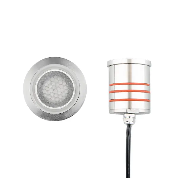LED Landscape recessed inground indicator luminaire for both soft and hard ground applications available in 1" or 2" sizes with round, slim, and square face plate options. The indicator light is perfect for outdoor applications, including wells and ponds, decks and patios, inground, as well as ceiling and wall applications. Factory sealed and IP68 Rated for Wet Locations or continuous immersion up to 5 meters underwater. Each indicator light includes 6' of low voltage burial cable, direct burial gel-filled wire nuts, and an optional spring retention clip. Magnetic Power supply is required. Concrete Pour Kits are available for additional installation options. Collection: 2022 Sub-Brand: Landscape Finish: Stainless Steel Notes: 2In Inground LED 12V Round Indicator Light With Honeycomb Louver In Stainless Steel Width: 2.75" Height: 3.13" Length: 2.75" Weight: 1.19 lb Extension from Wall: 2.75" Bulbs Included Number of Bulbs: 1 Maximum Wattage: 4.00 W Bulb Type: Module Bulb Base: LED Module Light Source: LED Light Output: 170.00 lm Delivered Lumens: 165.00 lm Color Temperature: 3000 K CRI: 85 Dimmable Beam Spread: 25.00° Rated Average Life: 70000 Voltage: 9.00 V Material: Solid stainless steel construction Country of Origin: Thailand Safety Listing: UL, cUL Safety Rating: UL, cUL LED Manufacturer Warranty: 10 year, Lifetime Finish Parts Diagram