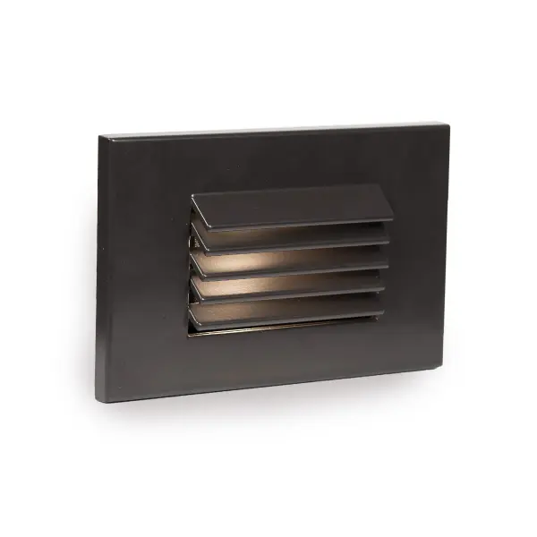 WAC Lighting Step and Wall Lights are designed to seamlessly blend into any architecture featuring a sleek interchangeable magnetic faceplate with no visible hardware. These luminaires offer enhanced energy-efficient functionality and optimized light output to adequately illuminate stairs, walls and walkways with little or no glare. Light engine is IP66 Rated for both indoor and outdoor applications. Collection: 4051 Sub-Brand: Landscape Finish: Bronze on Aluminum Notes: LED Low Voltage Horizontal Louvered Step And Wall Light Amber In Bronze Width: 3.13" Height: 1.75" Length: 5.00" Weight: 0.40 lb Extension from Wall: 5.00" Bulbs Included Number of Bulbs: 1 Maximum Wattage: 2.00 W Bulb Type: Module Bulb Base: LED Module Light Source: LED Light Output: 38.00 lm Delivered Lumens: 38.00 lm CRI: 90 Dimmable Rated Average Life: 60000 Voltage: 9.00 V Material: Corrosion resistant aluminum alloy Country of Origin: China Safety Listing: UL, cUL Safety Rating: UL, cUL ADA LED Manufacturer Warranty: 10 Year Parts Diagram