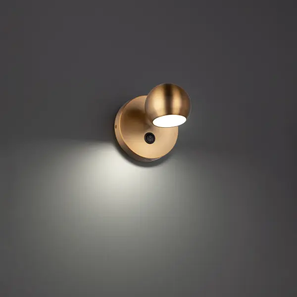 Dome light. A rotatable neck accents a circular appeal for multidirectional illumination.