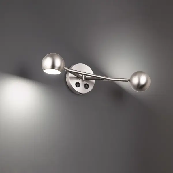 Dome light. A rotatable neck accents a circular appeal for multidirectional illumination.