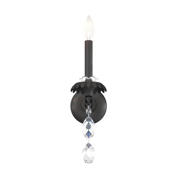 Slender, elegantly curved arms, draped in sparkling beads and drops, swag down from a column fashioned from Bohemian hand-cut crystal. Hand-finished tapers in matching lustrous finishes rest atop detailed Italian brass bobeches cast in the shape of open blooms.