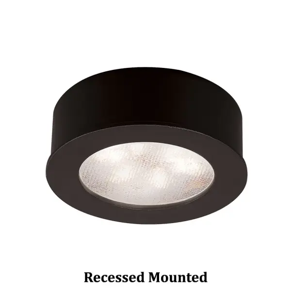 Designed with a low-profile and shallow installation depth for tight spaces, the innovative LED87 Button Lights can be surface mounted or recessed for a built-in look within shelves, under and inside cabinets, curios and displays in fine residential and retail environments delivering strong light output with the latest in LED technology.  Includes 72" of wire, Button Lights can be wired in a series to one another up to the maximum load on the power supply used. Class II, 24V remote and plug-in transformers allow up to 20 Button Lights to be wired together.