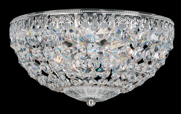 Inspired by the classical crystal basket designs and the purity of neoclassical lines, Petit Crystal features a densely woven crystal surface displaying concentric jewels of descending size that diffuse illumination over spaces below with shimmering vibrancy.