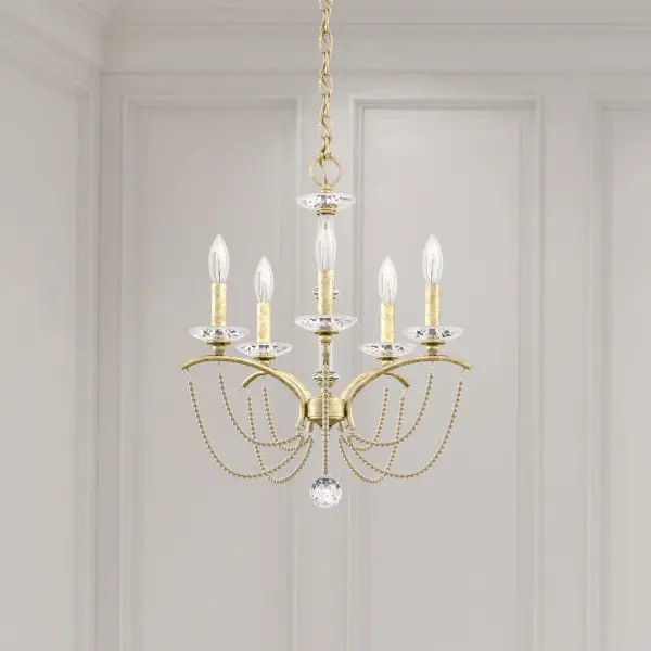 Light dances along bejeweled strands below playfully cantilevered arms for a whimsical flourish.  A statuary column of Bohemian crystal stands aloft to present a new take on Neoclassical Revival.