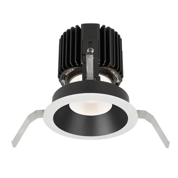 Volta LED downlight series represents an innovation in design and technology for architectural lighting. This high lumen and adaptable family of fixtures with a comprehensive set of round and square fittings, affords a sustainable solution for commercial, corporate, and upscale residential applications. Collection: Volta Sub-Brand: WAC Lighting Finish: Black/White Notes: Volta Round Shallow Regressed Trim With LED Light Engine Flood 45 Beam 3000K Soft White In Black White Width: 6.00" Height: 7.00" Length: 6.00" Weight: 2.19 lb Extension from Wall: 6.00" Bulbs Included Number of Bulbs: 1 Maximum Wattage: 36.00 W Bulb Type: Module Bulb Base: LED Module Light Source: LED Light Output: 2420.00 lm Delivered Lumens: 1380.00 lm Color Temperature: 3000 K CRI: 85 Dimmable Beam Spread: 45.00° Rated Average Life: 50000 Voltage: 120.00 V Material: Durable die-cast aluminum construction Country of Origin: China Safety Listing: ETL, cETL Safety Rating: ETL, cETL LED Manufacturer Warranty: 5 Year Functional, 2 Year Finish Parts Diagram