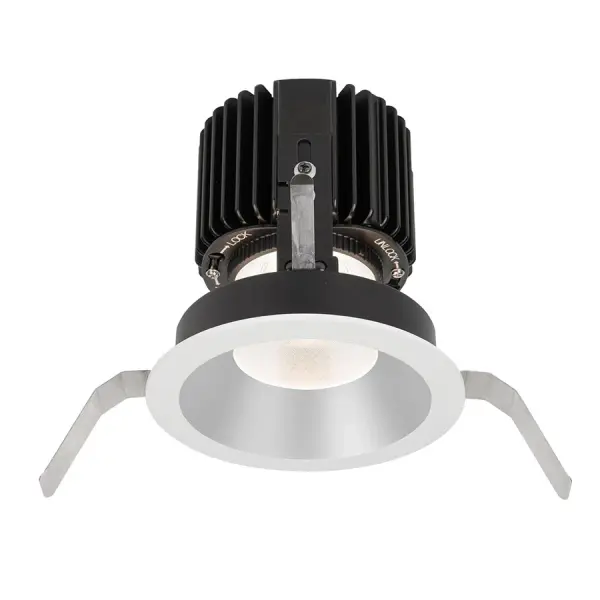 Volta LED downlight series represents an innovation in design and technology for architectural lighting. This high lumen and adaptable family of fixtures with a comprehensive set of round and square fittings, affords a sustainable solution for commercial, corporate, and upscale residential applications. Collection: Volta Sub-Brand: WAC Lighting Finish: Haze White Notes: Volta Round Shallow Regressed Trim With LED Light Engine Flood 45 Beam 3000K Soft White In Haze White Width: 6.00" Height: 7.00" Length: 6.00" Weight: 2.19 lb Extension from Wall: 6.00" Bulbs Included Number of Bulbs: 1 Maximum Wattage: 36.00 W Bulb Type: Module Bulb Base: LED Module Light Source: LED Light Output: 2420.00 lm Delivered Lumens: 1380.00 lm Color Temperature: 3000 K CRI: 85 Dimmable Beam Spread: 45.00° Rated Average Life: 50000 Voltage: 120.00 V Material: Durable die-cast aluminum construction Country of Origin: China Safety Listing: ETL, cETL Safety Rating: ETL, cETL LED Manufacturer Warranty: 5 Year Functional, 2 Year Finish Parts Diagram