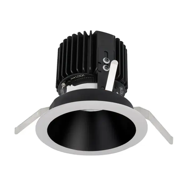 Volta LED downlight series represents an innovation in design and technology for architectural lighting. This high lumen and adaptable family of fixtures with a comprehensive set of round and square fittings, affords a sustainable solution for commercial, corporate, and upscale residential applications. Collection: Volta Sub-Brand: WAC Lighting Finish: Black/White Notes: Volta Round Trim With LED Light Engine Spot 15 Beam 2700K Warm White 90Cri In Black White Width: 6.00" Height: 7.00" Length: 6.00" Weight: 2.30 lb Extension from Wall: 6.00" Bulbs Included Number of Bulbs: 1 Maximum Wattage: 36.00 W Bulb Type: Module Bulb Base: LED Module Light Source: LED Light Output: 1062.00 lm Delivered Lumens: 542.00 lm Color Temperature: 2700 K CRI: 90 Dimmable Beam Spread: 15.00° Rated Average Life: 50000 Voltage: 120.00 V Material: Durable die-cast aluminum construction Country of Origin: China Safety Listing: ETL, cETL Safety Rating: ETL, cETL LED Manufacturer Warranty: 5 Year Functional, 2 Year Finish Parts Diagram