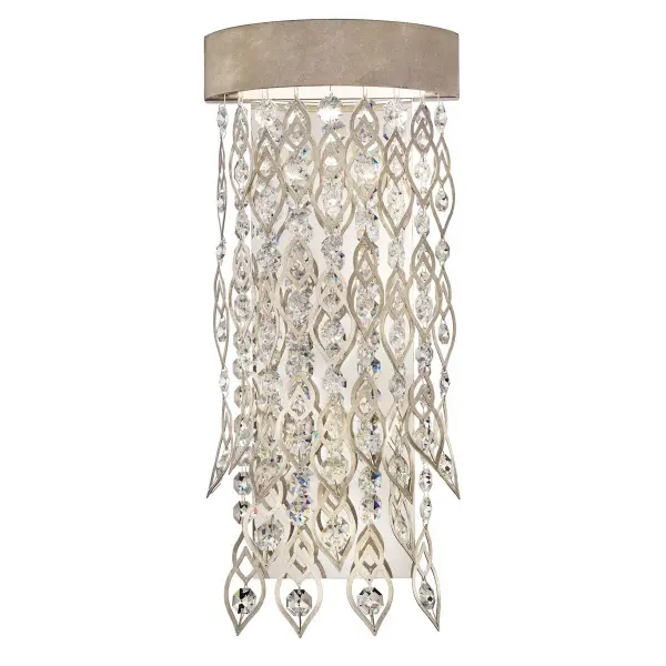 Cascading with gleaming brilliance and glistening gemstones, Pavona showcases a central waterfall of ethereal perfection. Its frame is beautifully adorned with multifaceted Radiance® Crystal drops and delicately handcrafted, feather-like metallic accents to complete its mystical composition.