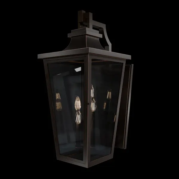 The Dannemore wall lantern combines timeless elegance with modern sensibility. Its tapered metal frame is crowned with a curved, pyramid-like top, creating a refined silhouette. Clear glass panes encase candles, while a mirrored back panel enhances their glow, casting radiant illumination across your outdoor space. Built to withstand changing weather conditions, this fixture ensures lasting beauty and performance, making it a perfect choice for enhancing your home's exterior.
