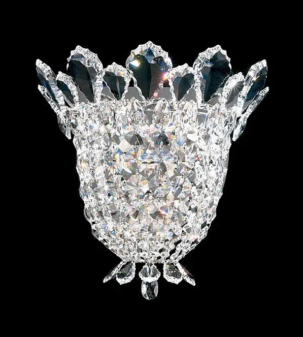 Crowned with identifying crystal pendeloques that fringe the collection, Trilliane blends the grandeur of antiquity with the frosted opulence of an all-crystal masterpiece.  Evoke the enchantment of living as a European royal of a bygone era.