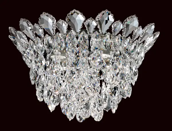 Despite being openly coquettish, Trilliane Strands shares a regal pedigree with her decorous sister. She unapologetically lets her hair down in a torrent of crystal strands beneath her crown of perched pendeloques as though with full knowledge that she is being admired.