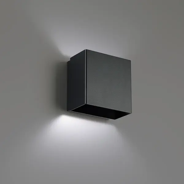 Utilitarian indirect illumination. Elevate the space. Collection: Boxi Sub-Brand: DweLED Finish: Black Notes: Boxi 5" LED Wall Sconce 3000K In Black Width: 3.00" Height: 4.75" Length: 4.75" Weight: 2.21 lb Extension from Wall: 4.75" Bulbs Included Number of Bulbs: 1 Maximum Wattage: 6.00 W Bulb Type: Module Light Source: LED Light Output: 288.00 lm Delivered Lumens: 116.00 lm Color Temperature: 3000 K CRI: 90 Dimmable Rated Average Life: 54000 Voltage: 120.00 V Material: Steel body, glass diffuser Country of Origin: China Safety Listing: ETL, cETL LED Manufacturer Warranty: 5 year