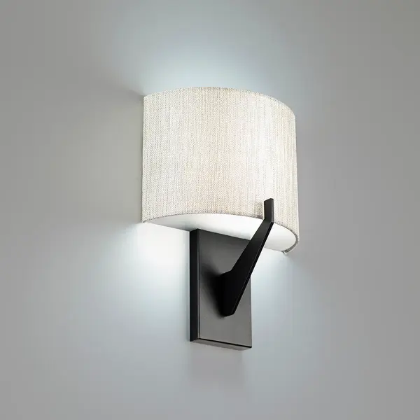 Legendary style without pretense. Effortlessly classy Collection: Fitzgerald Sub-Brand: DweLED Finish: Black Notes: Fitzgerald 8" LED Wall Sconce 3000K In Black Width: 4.13" Height: 11.00" Length: 8.00" Weight: 1.54 lb Extension from Wall: 8.00" Bulbs Included Number of Bulbs: 1 Maximum Wattage: 13.00 W Bulb Type: Module Light Source: LED Light Output: 1100.00 lm Delivered Lumens: 737.00 lm Color Temperature: 3000 K CRI: 90 Dimmable Rated Average Life: 54000 Voltage: 120.00 V Material: Aluminum body, fabric diffuser Country of Origin: China Safety Listing: ETL, cETL LED Manufacturer Warranty: 5 year