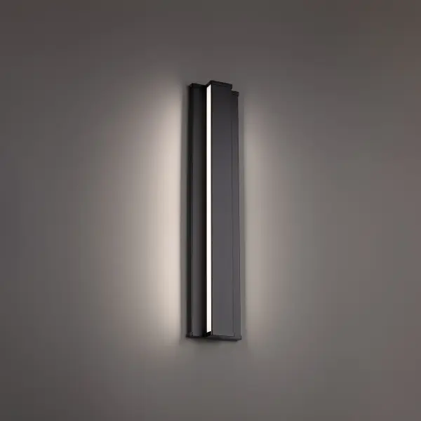 Balanced with geometric precision. A slim bar of light glowing between the lines of a minimal profile.