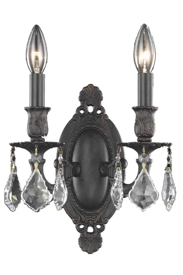 Rosalia collection wall sconces bring the decadence and splendor of Austro-Hungarian royalty into your home. A polished oval backplate with an intricate, etched design supports curved arms that bear exposed bulbs (not included) above while precision-cut crystal pendeloques shimmer below. Available in bold finishes (dark bronze, French gold, and pewter) that hint at the design's vintage-inspired origins, and with clear or golden-teak crystals, your guests will appreciate the royal treatment. Splendid in a bathroom, hallway, or bedroom. Collection: Rosalia Rooms: Hallway, Living room, Bedroom, Bathroom, Entry Way, Finish: Dark Bronze Crystal: clear Notes: Royal Cut Crystal (Clear) Width: 9.00" Height: 10.50" Length: 9.00" Weight: 5.00 lb Extension from Wall: 5.50" Wire: 23.62" Canopy: 4.33``x8.66`` Number of Bulbs: 2 Maximum Wattage: 40.00 W Bulb Type: B10 Bulb Base: E12 Dimmable Voltage: 110.00 V Material: Brass and Crystal Country of Origin: China Safety Listing: UL / Ulc Safety Rating: Damp Title 20 Title 24 Manufacturer Warranty: 1 year limited