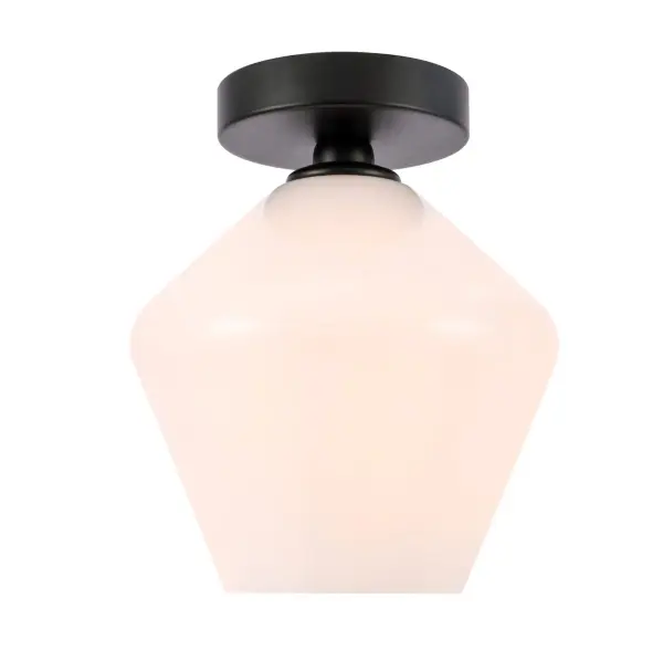 The Gene Collection of lights will be sure to have your guests admire your modern sense of style with the beautiful simplicity of its shape and form. This flush mount allows brilliant illumination to shine and radiate, allowing for your room to be center stage, and despite its minimalism, its design is far from boring--available in a brass, chrome, or black finish, with either a clear or frosted diamond glass shade. Enhance your bathroom, foyer, or hallways with the Gene Collection flush mount and live in sleek contemporary style (light bulbs not included). Collection: Gene Rooms: Hallway, Living room, Bedroom, Bathroom, Entry Way, Finish: Black and Frosted white glass Glass: Frosted White Width: 7.90" Height: 9.40" Length: 7.90" Weight: 1.50 lb Wire: 11" Black and White Canopy: 4.7"x1"x4.7" Number of Bulbs: 1 Maximum Wattage: 40.00 W Bulb Type: Filament Bulb Base: E26 Dimmable Voltage: 110.00 V Material: Iron and Glass Country of Origin: China Safety Listing: ETL Safety Rating: Dry Manufacturer Warranty: 1 year limited Spec Sheet