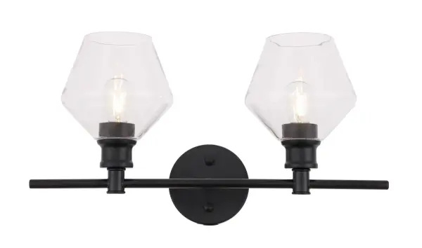 The Gene Collection of lights will be sure to have your guests admire your modern sense of style with the beautiful simplicity of its shape and form. The clean lines of the rhombus shaped shades create the juxtaposition of intricate simplicity, achieving a style that has both form and function. This wall lamp can be oriented facing up or down, but will always illuminate your room. Available in a brass, chrome, or black finish with either a clear or frosted rhombus glass shade, it is the perfect wall lamp to enhance your bathroom, foyer, or hallways, allowing you to always live in sleek contemporary style (light bulbs not included). Collection: Gene Rooms: Hallway, Living room, Bedroom, Bathroom, Entry Way, Finish: Black and Clear glass Glass: Clear Width: 8.00" Height: 10.20" Length: 19.10" Weight: 3.00 lb Wire: 11" Black and White Canopy: 4.7``x4.7``x1`` Number of Bulbs: 2 Maximum Wattage: 40.00 W Bulb Type: ST18 Bulb Base: E26 Dimmable Voltage: 110.00 V Material: Iron and Glass Country of Origin: China Safety Listing: ETL Safety Rating: Damp Title 20 Title 24 Manufacturer Warranty: 1 year limited Spec Sheet