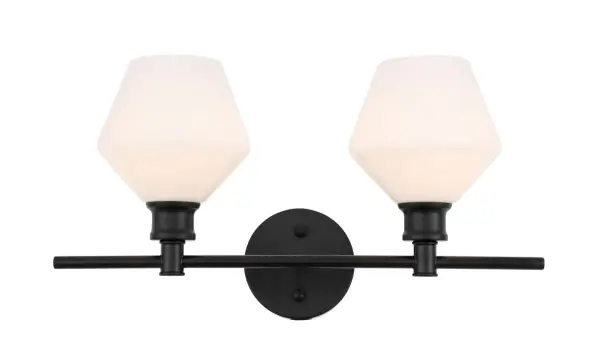 The Gene Collection of lights will be sure to have your guests admire your modern sense of style with the beautiful simplicity of its shape and form. The clean lines of the rhombus shaped shades create the juxtaposition of intricate simplicity, achieving a style that has both form and function. This wall lamp can be oriented facing up or down, but will always illuminate your room. Available in a brass, chrome, or black finish with either a clear or frosted rhombus glass shade, it is the perfect wall lamp to enhance your bathroom, foyer, or hallways, allowing you to always live in sleek contemporary style (light bulbs not included). Collection: Gene Rooms: Hallway, Living room, Bedroom, Bathroom, Entry Way, Finish: Black and Frosted white glass Glass: Frosted White Width: 8.00" Height: 10.20" Length: 19.10" Weight: 3.00 lb Wire: 11" Black and White Canopy: 4.7``x4.7``x1`` Number of Bulbs: 2 Maximum Wattage: 40.00 W Bulb Type: ST18 Bulb Base: E26 Dimmable Voltage: 110.00 V Material: Iron and Glass Country of Origin: China Safety Listing: ETL Safety Rating: Damp Title 20 Title 24 Manufacturer Warranty: 1 year limited Spec Sheet