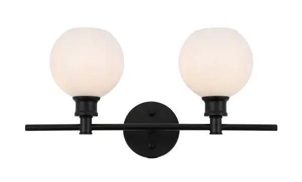 The Collier Collection of lights will be sure to have your guests admire your modern sense of style with the beautiful simplicity of its shape and form. The clean lines of the ball shaped shades create the juxtaposition of intricate simplicity, achieving a style that has both form and function. This wall lamp can be oriented facing up or down, but will always illuminate your room. Available in a brass, chrome, or black finish with either a clear or frosted ball glass shade, it is the perfect wall lamp to enhance your bathroom, foyer, or hallways, allowing you to always live a chic and fashionable lifestyle (light bulbs not included). Collection: Collier Rooms: Hallway, Living room, Bedroom, Bathroom, Entry Way, Finish: Black and Frosted white glass Glass: Frosted White Width: 8.00" Height: 9.80" Length: 19.10" Weight: 3.00 lb Wire: 11" Black and White Canopy: 4.7``x4.7``x1`` Number of Bulbs: 2 Maximum Wattage: 40.00 W Bulb Type: ST18 Bulb Base: E26 Dimmable Voltage: 110.00 V Material: Iron and Glass Country of Origin: China Safety Listing: ETL Safety Rating: Damp Title 20 Title 24 Manufacturer Warranty: 1 year limited Spec Sheet