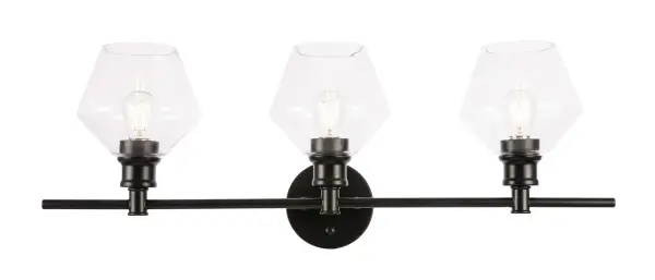The Gene Collection of lights will be sure to have your guests admire your modern sense of style with the beautiful simplicity of its shape and form. The clean lines of the rhombus shaped shades create the juxtaposition of intricate simplicity, achieving a style that has both form and function. This wall lamp can be oriented facing up or down, but will always illuminate your room. Available in a brass, chrome, or black finish with either a clear or frosted rhombus glass shade, it is the perfect wall lamp to enhance your bathroom, foyer, or hallways, allowing you to always live in sleek contemporary style (light bulbs not included). Collection: Gene Rooms: Hallway, Living room, Bedroom, Bathroom, Entry Way, Finish: Black and Clear glass Glass: Clear Width: 8.00" Height: 10.20" Length: 28.10" Weight: 5.00 lb Wire: 11" Black and White Canopy: 4.7``x4.7``x1`` Number of Bulbs: 3 Maximum Wattage: 40.00 W Bulb Type: ST18 Bulb Base: E26 Dimmable Voltage: 110.00 V Material: Iron and Glass Country of Origin: China Safety Listing: ETL Safety Rating: Damp Title 20 Title 24 Manufacturer Warranty: 1 year limited Spec Sheet