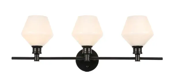 The Gene Collection of lights will be sure to have your guests admire your modern sense of style with the beautiful simplicity of its shape and form. The clean lines of the rhombus shaped shades create the juxtaposition of intricate simplicity, achieving a style that has both form and function. This wall lamp can be oriented facing up or down, but will always illuminate your room. Available in a brass, chrome, or black finish with either a clear or frosted rhombus glass shade, it is the perfect wall lamp to enhance your bathroom, foyer, or hallways, allowing you to always live in sleek contemporary style (light bulbs not included). Collection: Gene Rooms: Hallway, Living room, Bedroom, Bathroom, Entry Way, Finish: Black and Frosted white glass Glass: Frosted White Width: 8.00" Height: 10.20" Length: 28.10" Weight: 5.00 lb Wire: 11" Black and White Canopy: 4.7``x4.7``x1`` Number of Bulbs: 3 Maximum Wattage: 40.00 W Bulb Type: ST18 Bulb Base: E26 Dimmable Voltage: 110.00 V Material: Iron and Glass Country of Origin: China Safety Listing: ETL Safety Rating: Damp Title 20 Title 24 Manufacturer Warranty: 1 year limited Spec Sheet