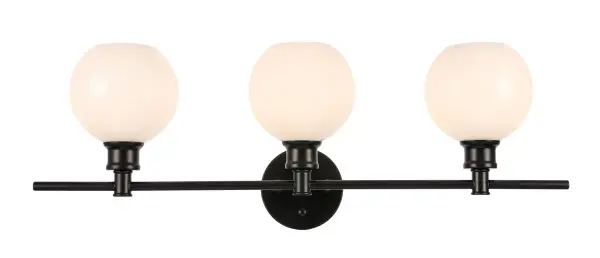 The Collier Collection of lights will be sure to have your guests admire your modern sense of style with the beautiful simplicity of its shape and form. The clean lines of the ball shaped shades create the juxtaposition of intricate simplicity, achieving a style that has both form and function. This wall lamp can be oriented facing up or down, but will always illuminate your room. Available in a brass, chrome, or black finish with either a clear or frosted ball glass shade, it is the perfect wall lamp to enhance your bathroom, foyer, or hallways, allowing you to always live a chic and fashionable lifestyle (light bulbs not included). Collection: Collier Rooms: Hallway, Living room, Bedroom, Bathroom, Entry Way, Finish: Black and Frosted white glass Glass: Frosted White Width: 8.00" Height: 9.80" Length: 28.10" Weight: 5.00 lb Wire: 11" Black and White Canopy: 4.7``x4.7``x1`` Number of Bulbs: 3 Maximum Wattage: 40.00 W Bulb Type: ST18 Bulb Base: E26 Dimmable Voltage: 110.00 V Material: Iron and Glass Country of Origin: China Safety Listing: ETL Safety Rating: Damp Title 20 Title 24 Manufacturer Warranty: 1 year limited Spec Sheet