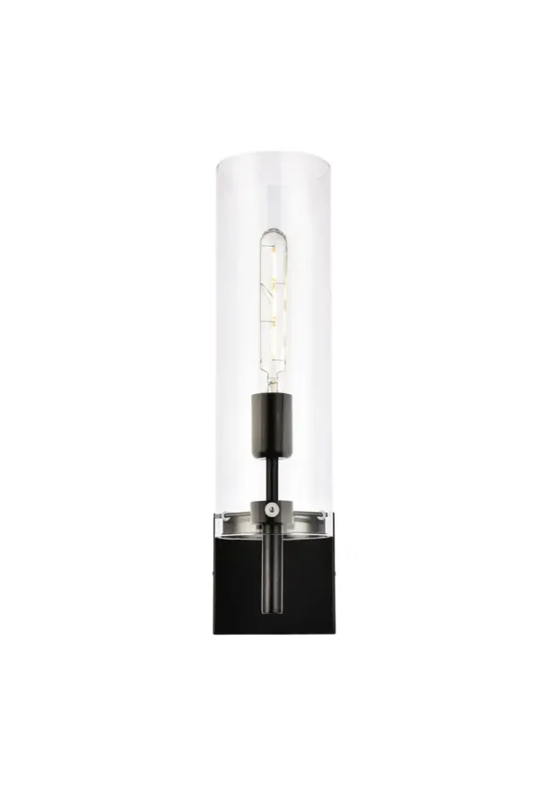 The Savant Collection wall sconce is a simple, but excellent piece to have. The cylinder shape creates an intriguing look that will fit in with your aesthetic. Available in a black or brass finish you will have no problem blending it into any space. This product is dimmable and requires one E26 socket. Light bulbs not included. Collection: Savant Rooms: Dining room, Living room, Bedroom, Bathroom, Entry Way, Closet Finish: Black and Clear Glass: Clear Width: 7.40" Height: 17.50" Length: 4.70" Weight: 3.00 lb Extension from Wall: 7.40" Wire: 11" Black and White Canopy: 4.7"x4.7"x1" Number of Bulbs: 1 Maximum Wattage: 40.00 W Bulb Type: E26 Bulb Base: E26 Dimmable Voltage: 110.00 V Material: Iron and Glass Country of Origin: China Safety Listing: ETL Safety Rating: Damp Title 20 Title 24 Manufacturer Warranty: 1 year limited Spec Sheet