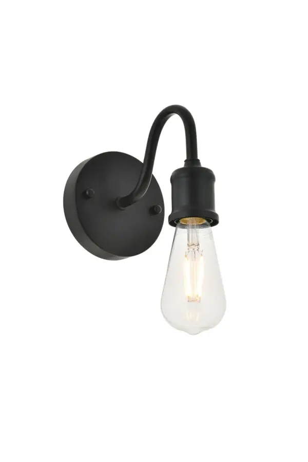 The classical elegance of the Serif collection wall lamp in a black finish brings graceful allure. Its tilde-like arm supports the light that emits a reassuring brilliance, and its gentle presence makes it a wonderful fixture to greet your guests at the entry way, illuminate your nightstands in the bedrooms, or shine in the powder room. Collection: Serif Rooms: living room, kitchen, office, hallway Finish: black Width: 4.70" Height: 5.30" Length: 4.70" Weight: 0.50 lb Extension from Wall: 6.90" Wire: 9" black and white Canopy: 4.7``x1`` Number of Bulbs: 1 Maximum Wattage: 40.00 W Bulb Type: ST18 Bulb Base: E26 Dimmable Voltage: 110.00 V Material: metal Country of Origin: China Safety Listing: ETL Safety Rating: Damp Title 20 Title 24 Manufacturer Warranty: 1 year limited