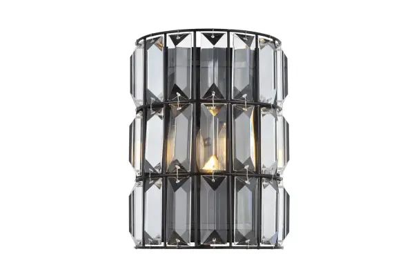 The Blair collection brings magnificent contemporary elegance to your hallway, study, or media room. This sconce is set in a cylindrical, Iron frame with an oil-rubbed bronze finish. The open, cage-like design forms three rows of rectangular spaces adorned with large, clear royal-cut baguette Crystals that gracefully refract light while drawing the eye to their organic beauty. Collection: Blair Rooms: Bathroom, hallways, bedroom Finish: Oil rubbed bronze Crystal: CLEAR Width: 4.80" Height: 9.80" Length: 7.90" Weight: 4.00 lb Extension from Wall: 4.80" Canopy: 9.4``x6.9``x0.8`` Number of Bulbs: 1 Maximum Wattage: 40.00 W Bulb Type: B10 Bulb Base: E12 Dimmable Voltage: 110.00 V Material: Iron Country of Origin: China Safety Listing: ETL Safety Rating: Damp Title 20 Title 24 Manufacturer Warranty: 1 year limited Spec Sheet
