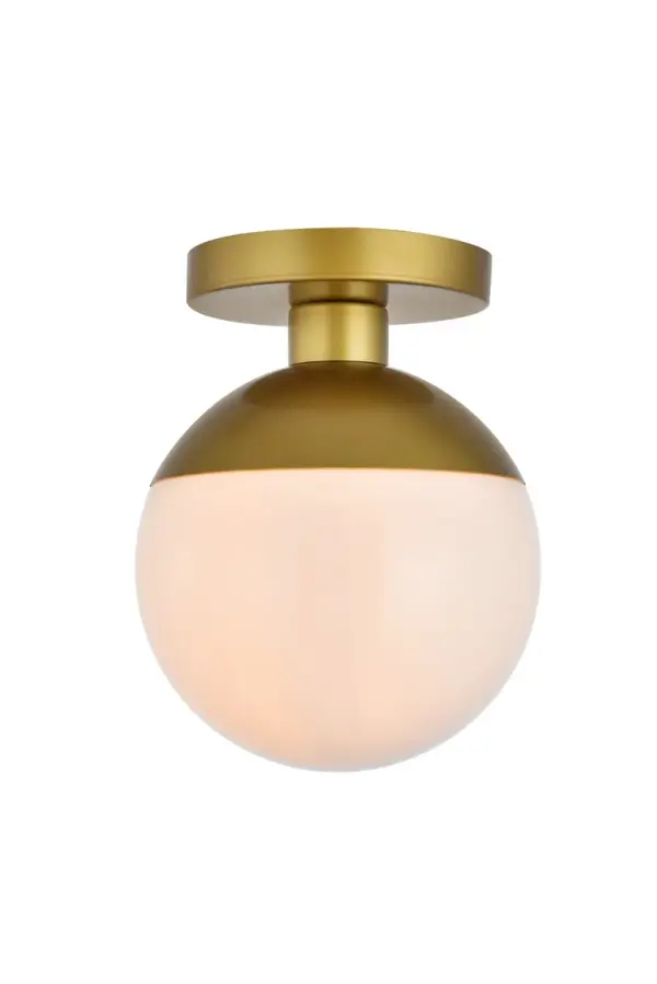 Refined style with a practical design, Eclipse flush mount bring cosmopolitan sophistication anywhere, especially to an entryway, office, bathroom, bedroom, or kitchen. The smooth iron frame features a disk-shaped canopy and comes in a brass finish. A touch of color on top of the frosted white spherical glass shade brings character to this classic style. Living in the big city has never been this easy. Collection: Eclipse Rooms: entryway, office, bathroom, bedroom, or kitchen Finish: Brass and frosted white Glass: Frosted White Width: 8.00" Height: 10.00" Length: 8.00" Weight: 3.00 lb Wire: 10" Black and white Canopy: 6"x1"x6" Number of Bulbs: 1 Maximum Wattage: 40.00 W Bulb Type: E26 Bulb Base: E26 Dimmable Voltage: 110.00 V Material: Metal and Glass Country of Origin: China Safety Listing: ETL Safety Rating: UL,ULC Manufacturer Warranty: 1 year limited Spec Sheet