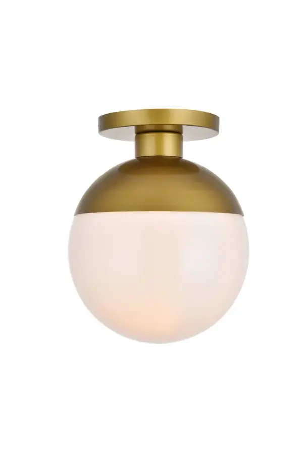 Refined style with a practical design, Eclipse flush mount bring cosmopolitan sophistication anywhere, especially to an entryway, office, bathroom, bedroom, or kitchen. The smooth iron frame features a disk-shaped canopy and comes in a brass finish. A touch of color on top of the frosted white spherical glass shade brings character to this classic style. Living in the big city has never been this easy. Collection: Eclipse Rooms: entryway, office, bathroom, bedroom, or kitchen Finish: Brass and frosted white Glass: Frosted White Width: 12.00" Height: 14.50" Length: 12.00" Weight: 6.00 lb Wire: 10" Black and white Canopy: 8"x1"x8" Number of Bulbs: 1 Maximum Wattage: 40.00 W Bulb Type: E26 Bulb Base: E26 Dimmable Voltage: 110.00 V Material: Metal and Glass Country of Origin: China Safety Listing: ETL Safety Rating: UL,ULC Manufacturer Warranty: 1 year limited Spec Sheet